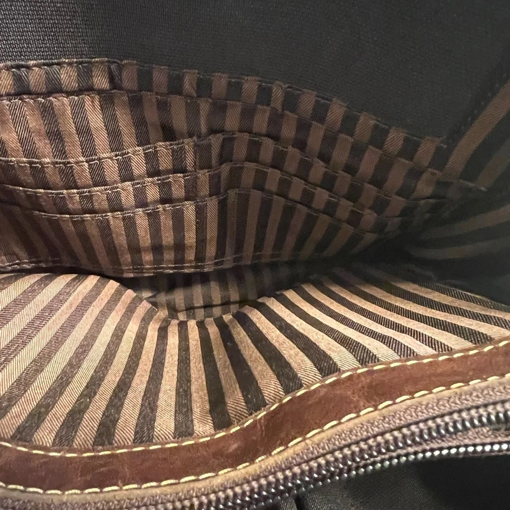 Jack George’s brown leather back pack